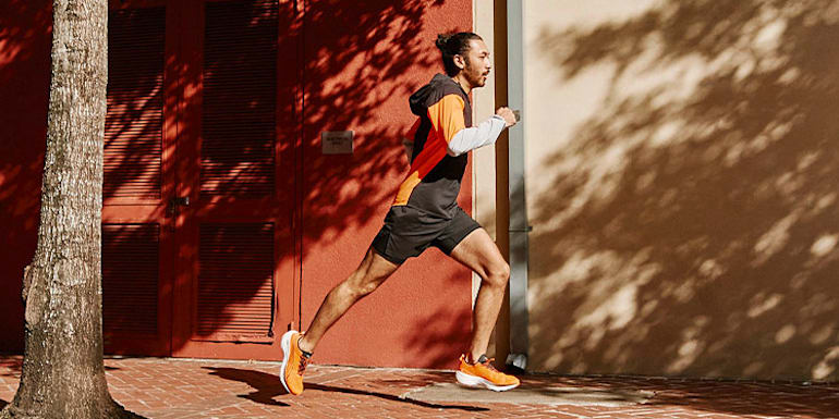 Orange running shoes sales